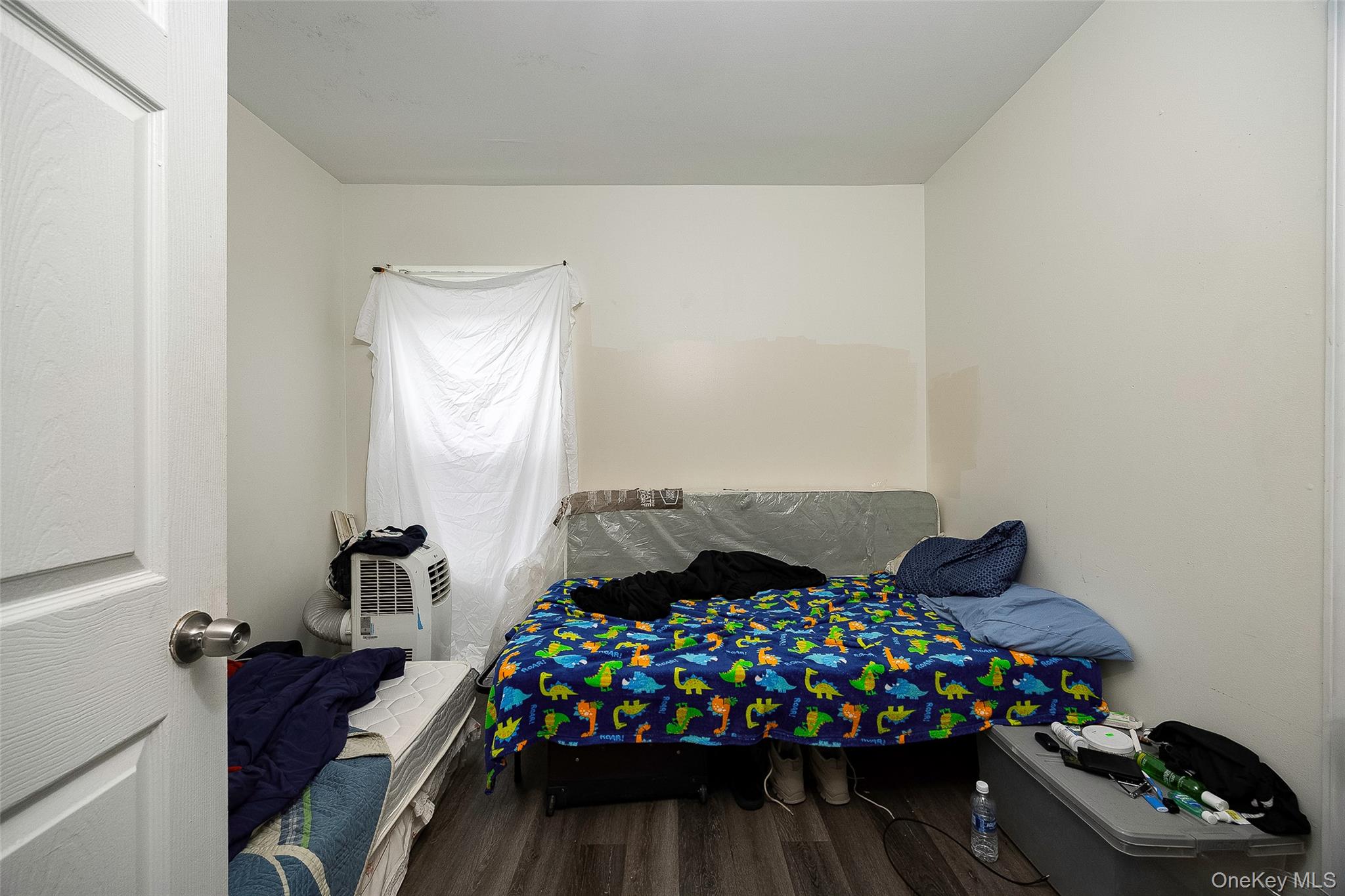 52 Parker Avenue Poughkeepsie, NY 12601 - Photo 9 of 12 a room with toys and wooden floor