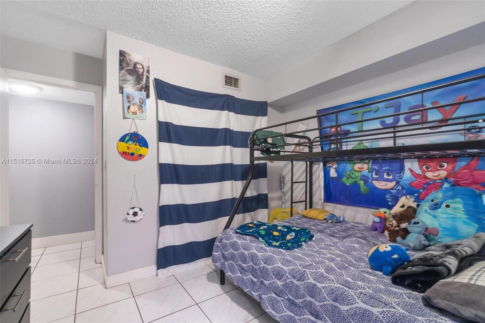 1900 West 68th Street, Unit E104 Hialeah, FL 33014 - Photo 24 of 31 a view of an entryway with a chandelier