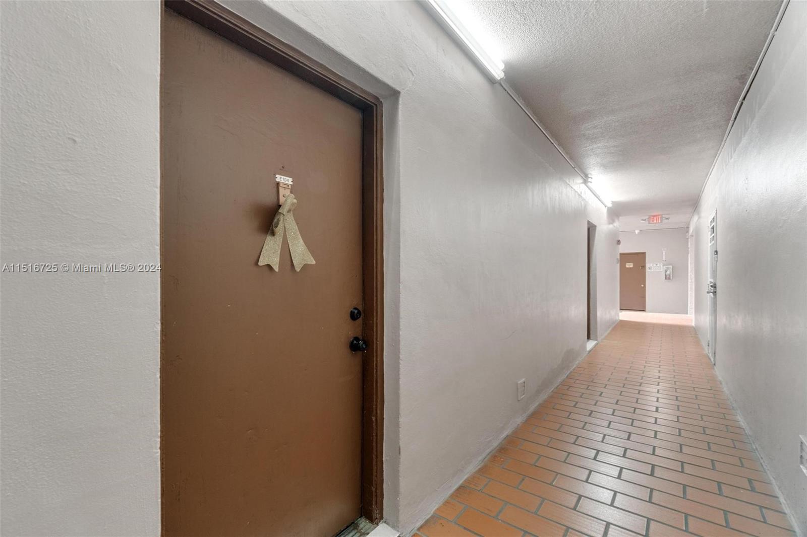 1900 West 68th Street, Unit E104 Hialeah, FL 33014 - Photo 27 of 31 a view of a hallway