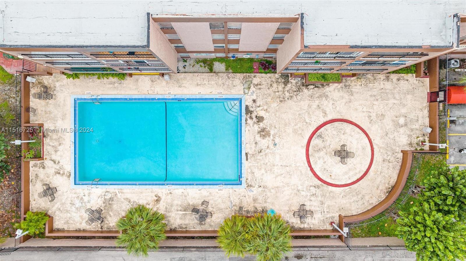 1900 West 68th Street, Unit E104 Hialeah, FL 33014 - Photo 28 of 31 a picture of a bathroom with a sink and a mirror