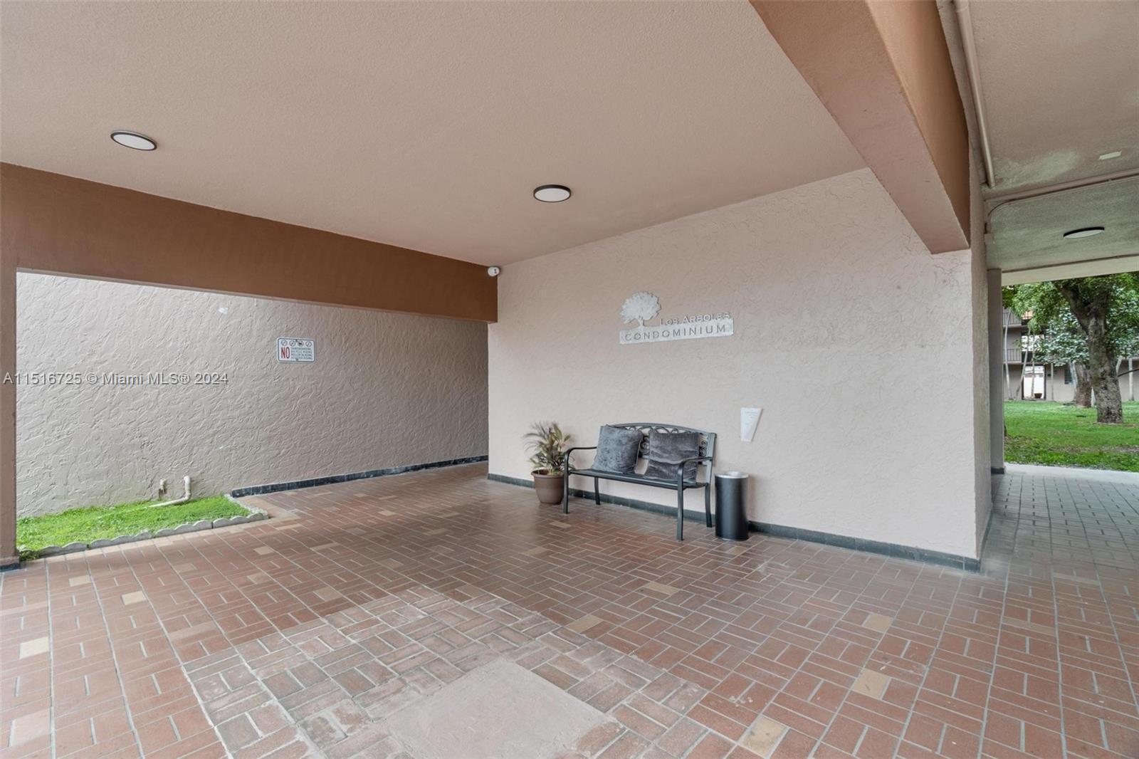 1900 West 68th Street, Unit E104 Hialeah, FL 33014 - Photo 31 of 31 a view of outdoor space with seating area