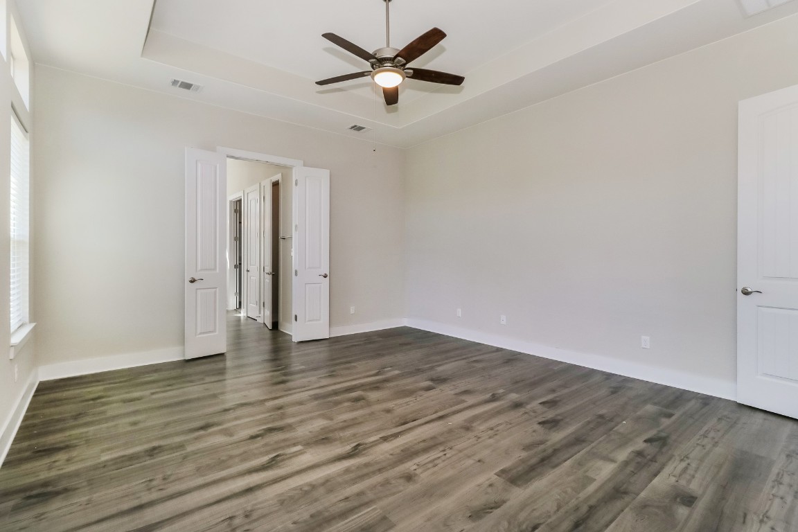 6101 Antelope Well Lane Austin, TX 78738 - Photo 16 of 36 wooden floor in an empty room