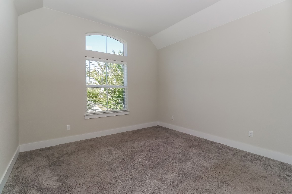 6101 Antelope Well Lane Austin, TX 78738 - Photo 19 of 36 an empty room with a window