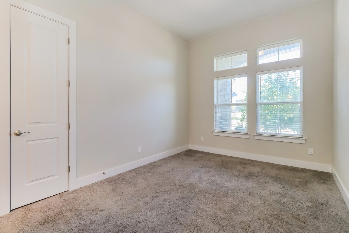 6101 Antelope Well Lane Austin, TX 78738 - Photo 24 of 36 an empty room with a window