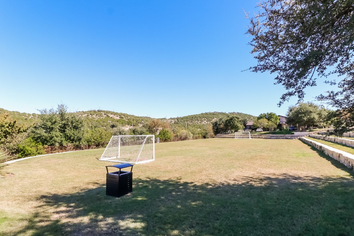 6101 Antelope Well Lane Austin, TX 78738 - Photo 35 of 36 a view of a lake with a mountain in the background