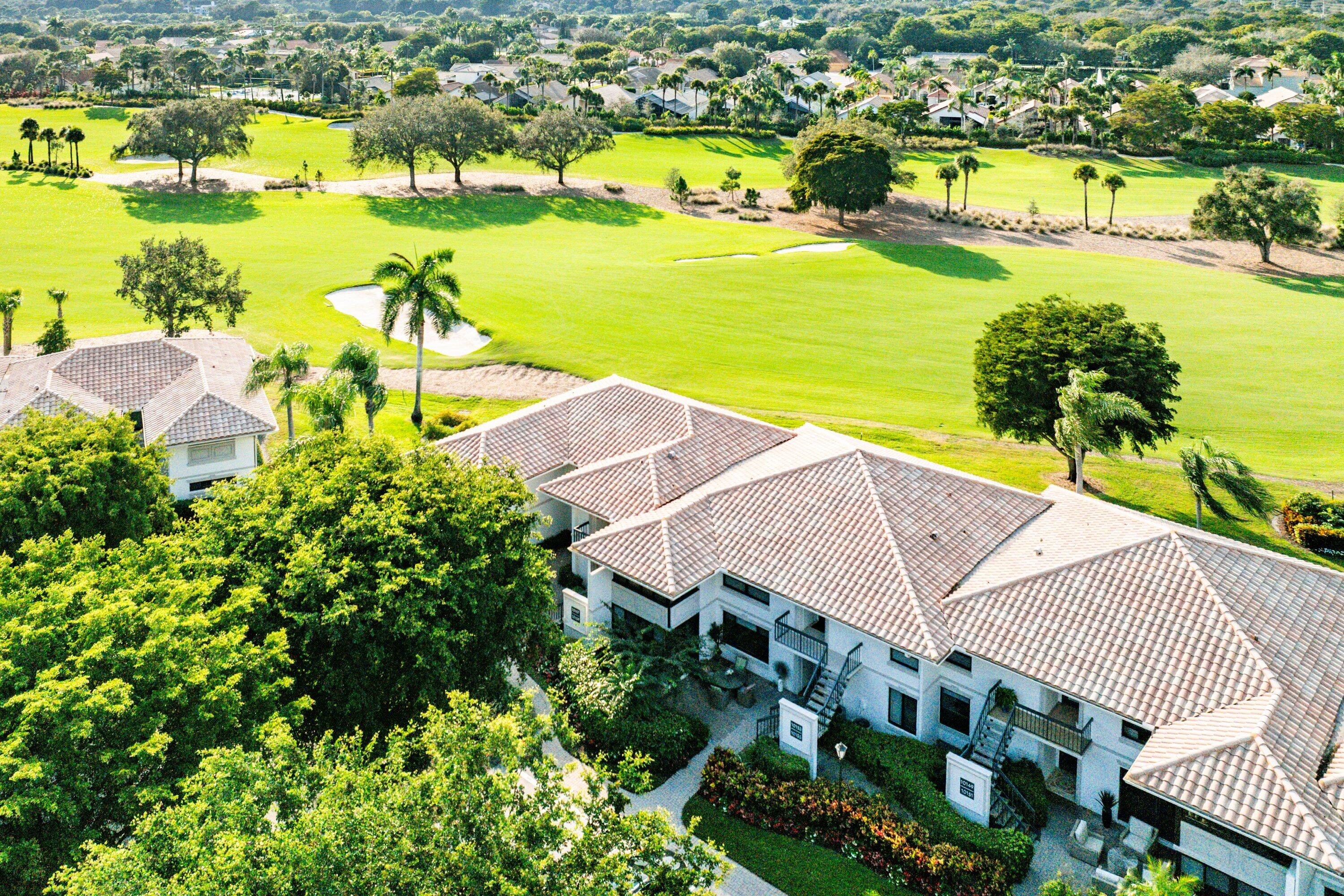 10157 Quail Covey Road, Unit HIBISCUS N Boynton Beach, FL 33436 - Photo 31 of 52 an aerial view of residential houses with outdoor space and ocean view