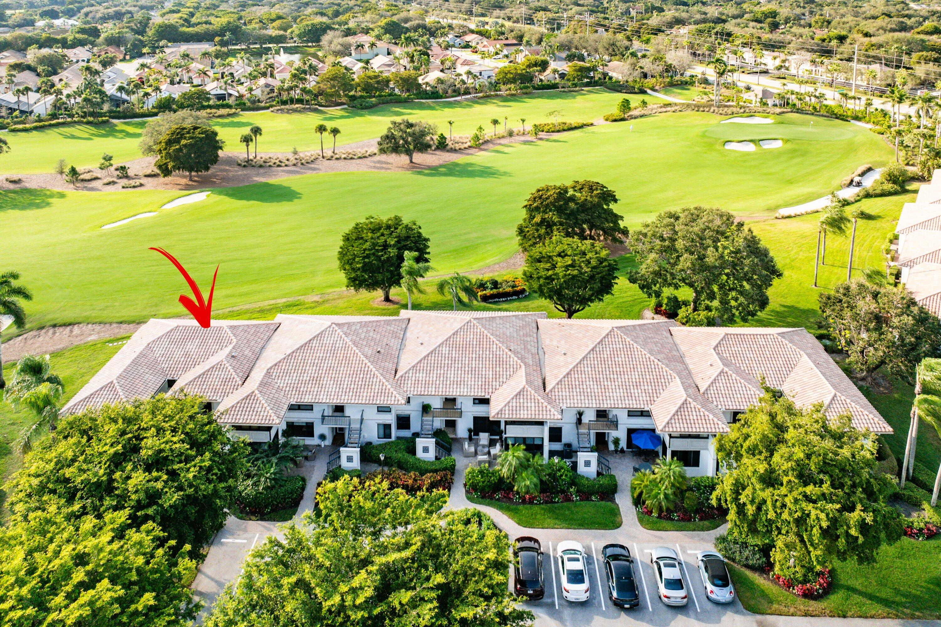 10157 Quail Covey Road, Unit HIBISCUS N Boynton Beach, FL 33436 - Photo 32 of 52 an aerial view of residential houses with outdoor space and swimming pool