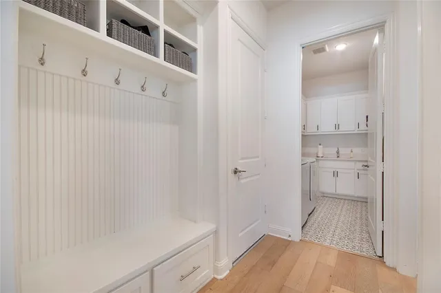 a bathroom with a sink and a shower