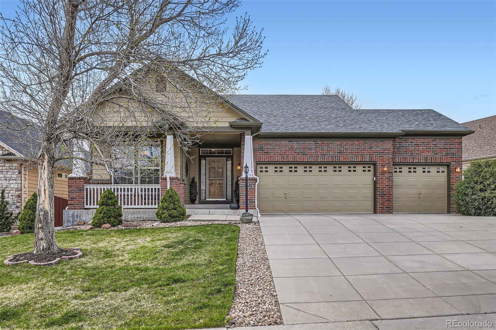 a front view of a building with garden
