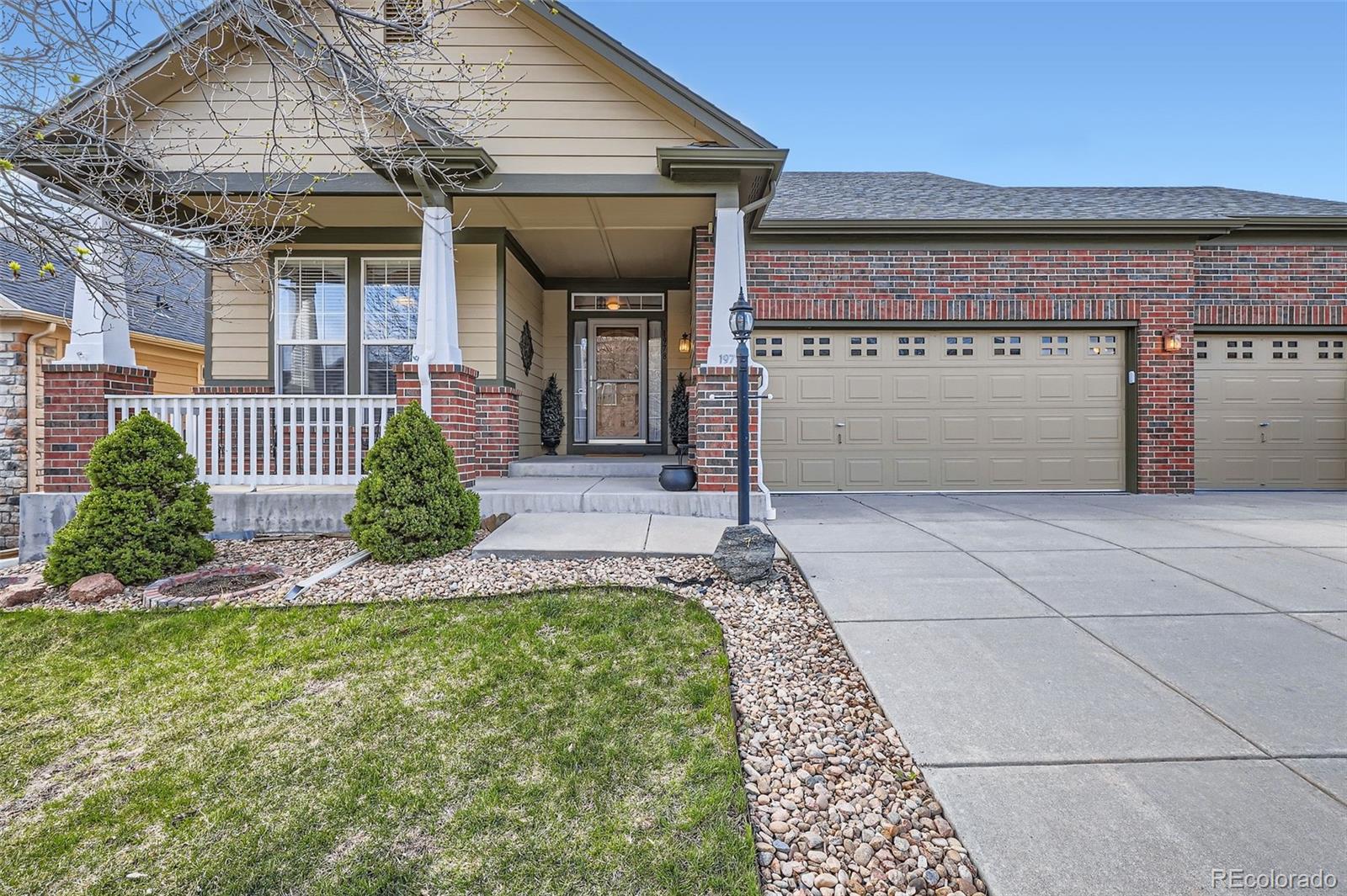 1978 Granger Circle Castle Rock, CO 80109 - Photo 2 of 31 a front view of a house with garden