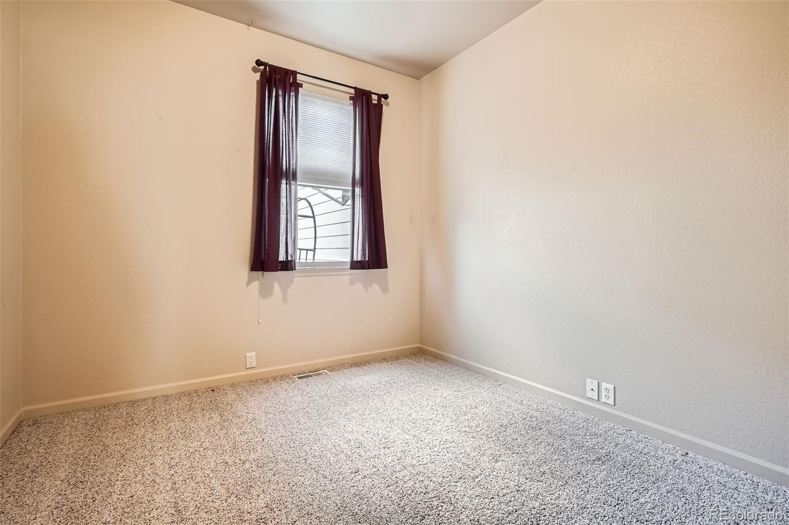 1978 Granger Circle Castle Rock, CO 80109 - Photo 22 of 31 an empty room with windows
