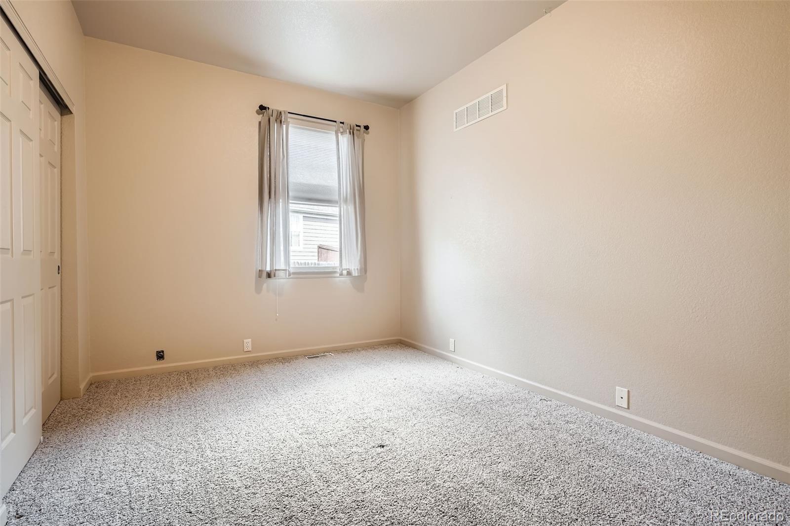 1978 Granger Circle Castle Rock, CO 80109 - Photo 23 of 31 an empty room with a window