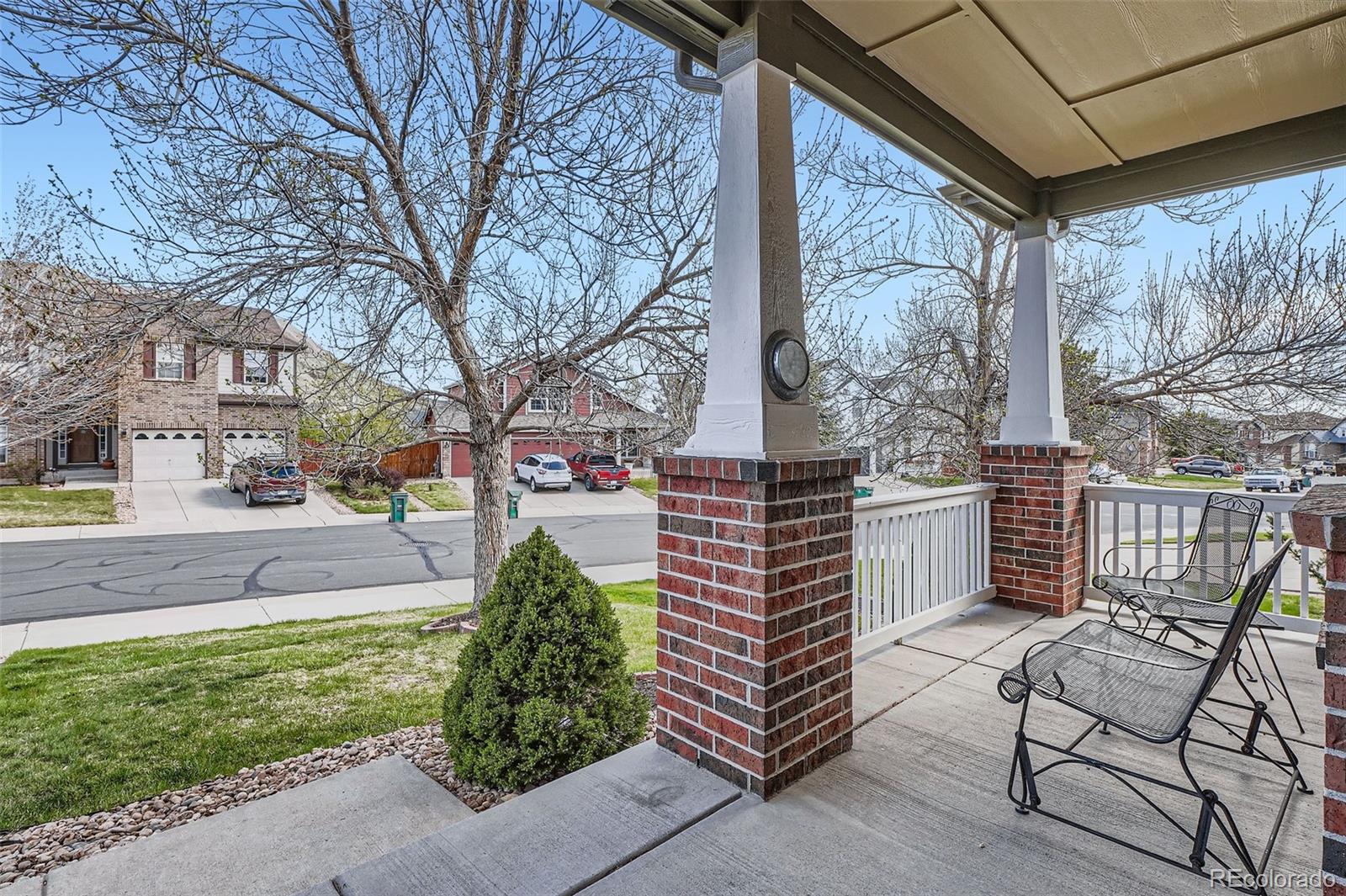 1978 Granger Circle Castle Rock, CO 80109 - Photo 3 of 31 a view of a patio with chair and table and chairs and wooden fence