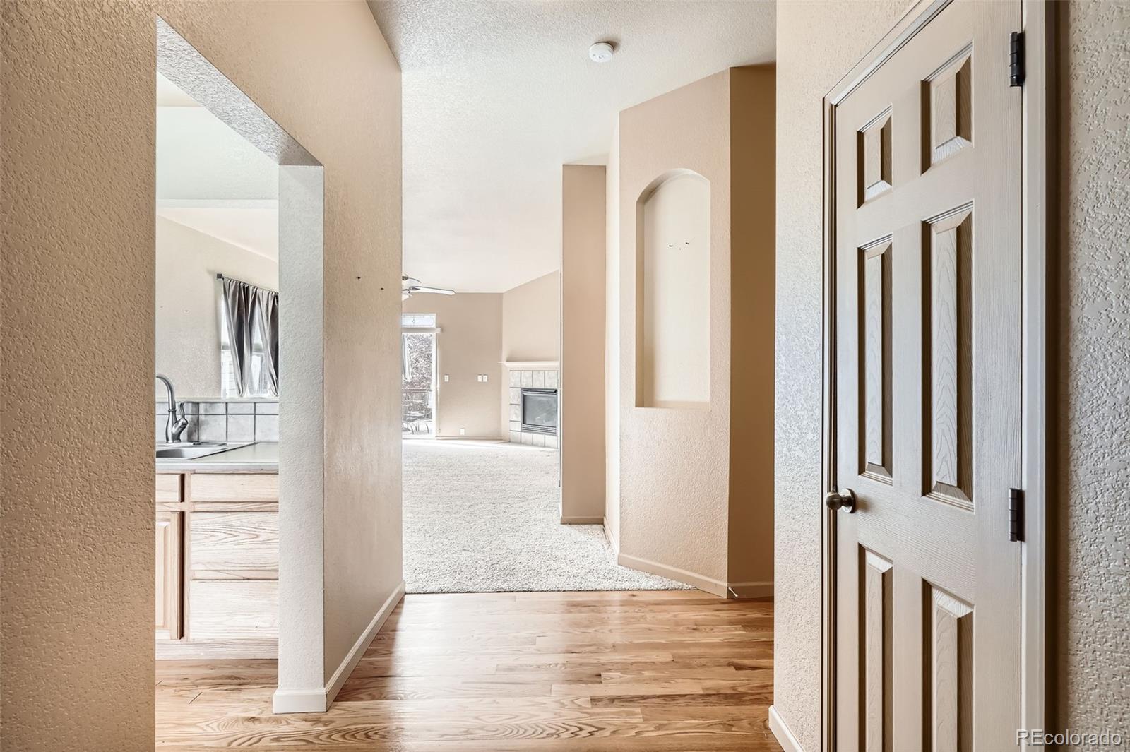 1978 Granger Circle Castle Rock, CO 80109 - Photo 4 of 31 a view of an entryway with wooden floor