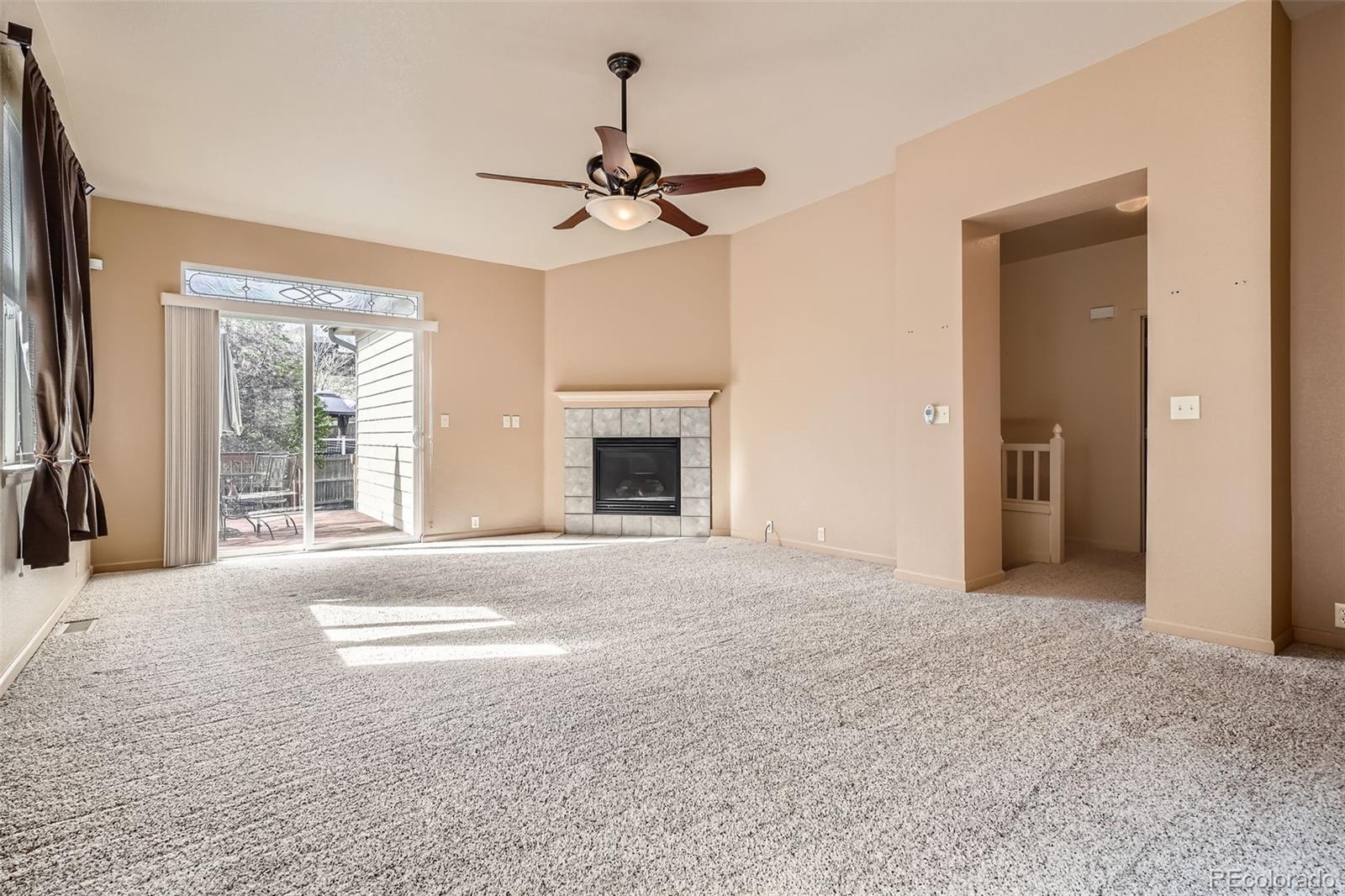 1978 Granger Circle Castle Rock, CO 80109 - Photo 7 of 31 a view of empty room with a fireplace