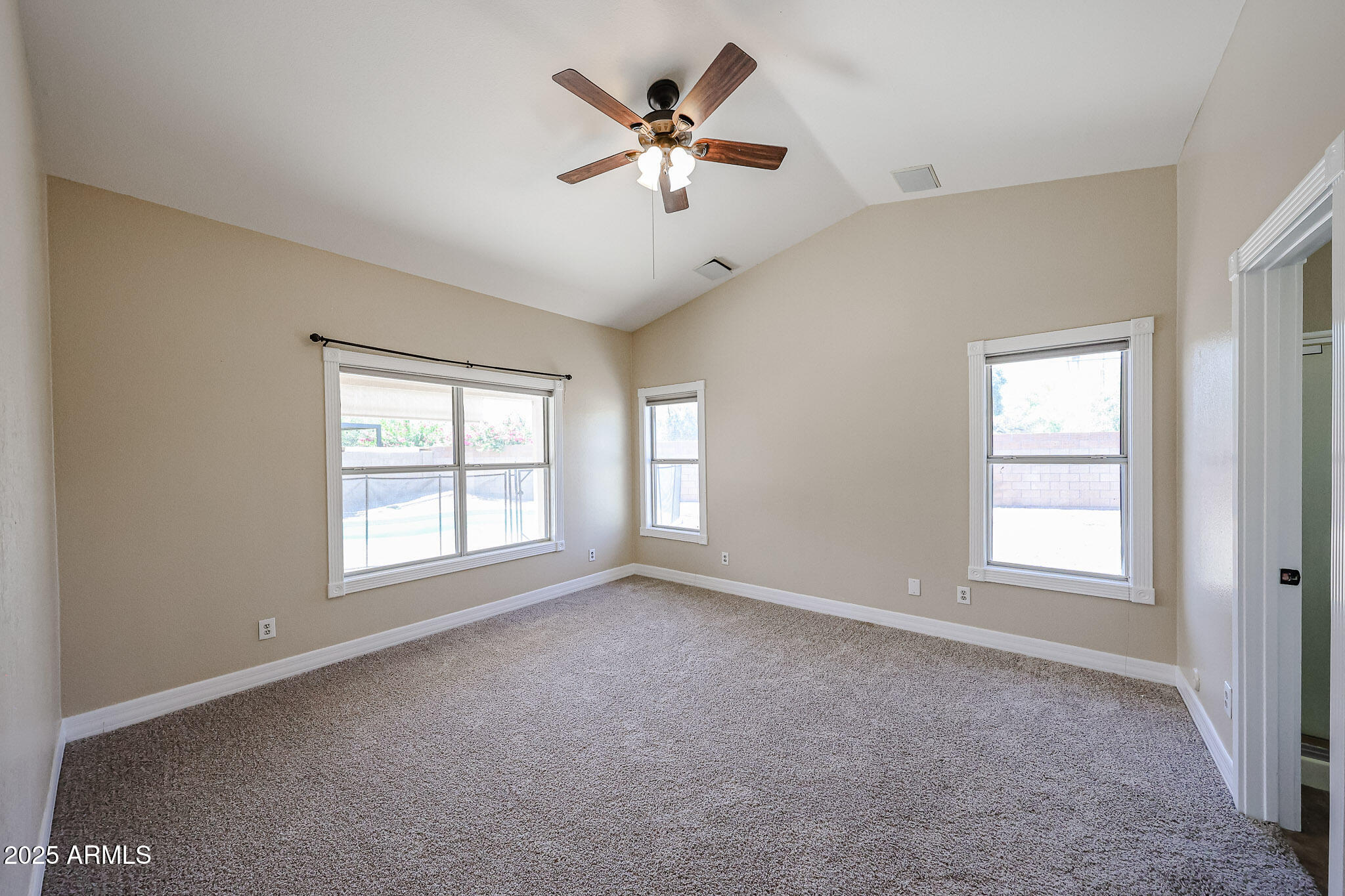 3897 East Douglas Loop Gilbert, AZ 85234 - Photo 13 of 34 a view of an empty room with a window