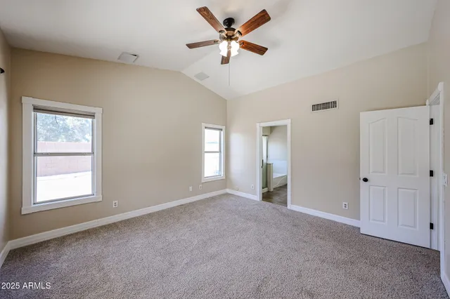 a bathroom with a tub and shower