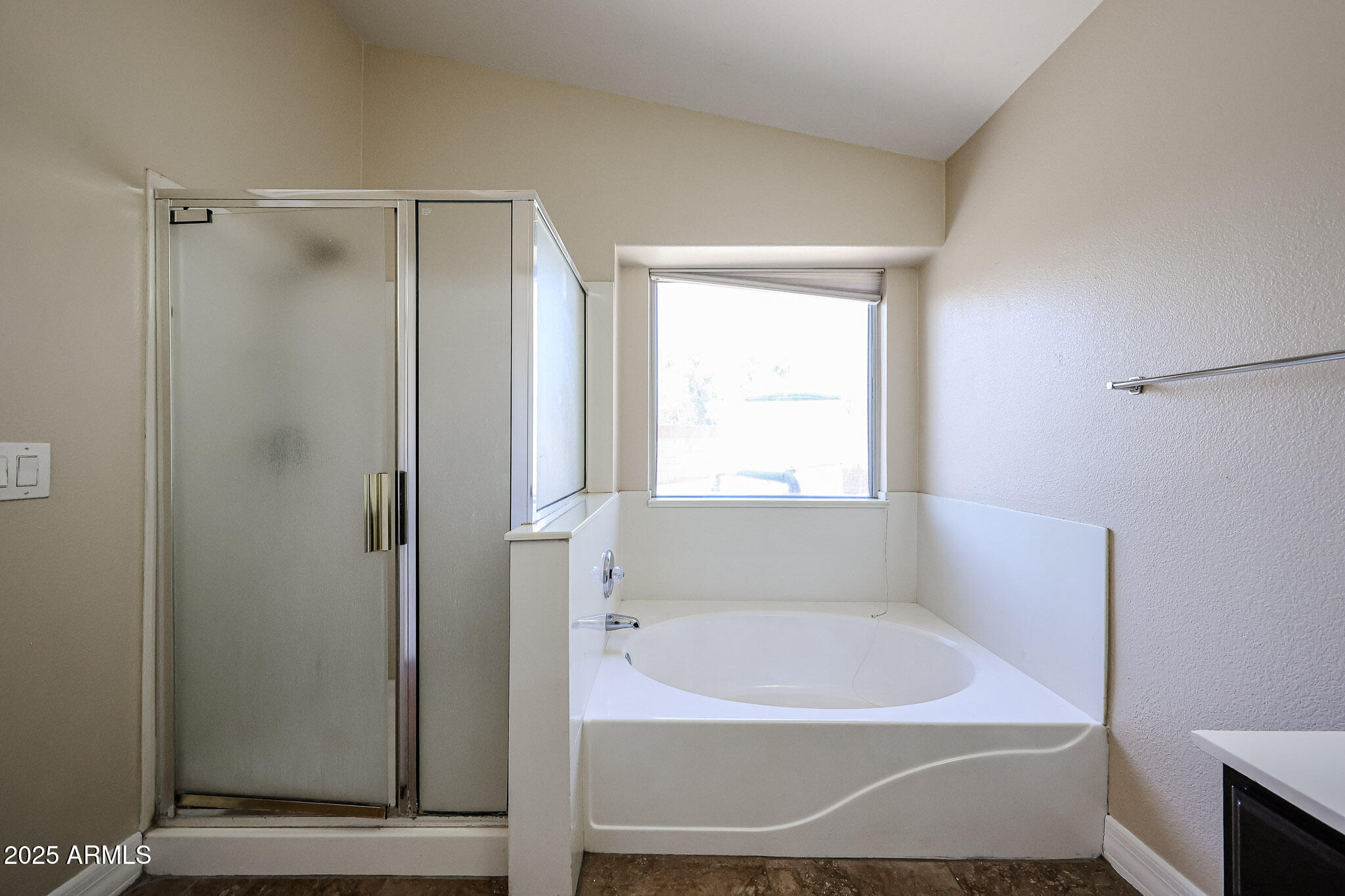 3897 East Douglas Loop Gilbert, AZ 85234 - Photo 17 of 34 a bathroom with a tub shower and a sink