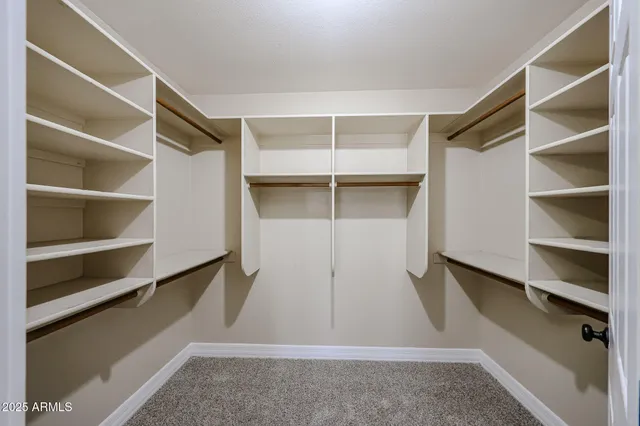 a view of a livingroom with a ceiling fan