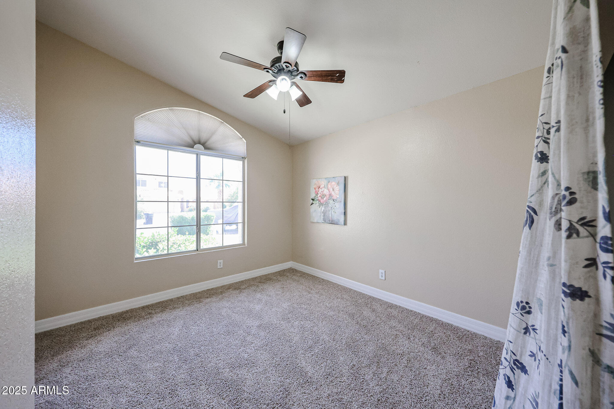 3897 East Douglas Loop Gilbert, AZ 85234 - Photo 23 of 34 a view of an empty room with a window