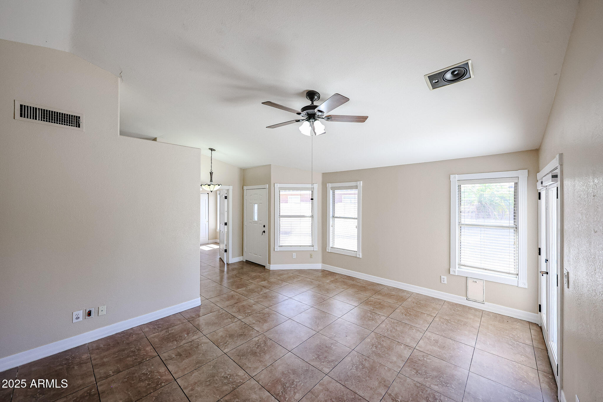 3897 East Douglas Loop Gilbert, AZ 85234 - Photo 6 of 34 a view of an empty room with a window