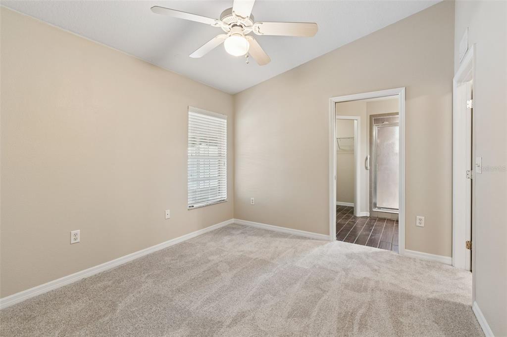 4631 Eagle Ranch Drive Zephyrhills, FL 33542 - Photo 20 of 58 a view of an empty room with a window