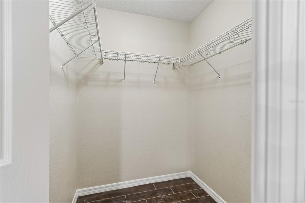 4631 Eagle Ranch Drive Zephyrhills, FL 33542 - Photo 27 of 58 a view of a room with racks on the wall