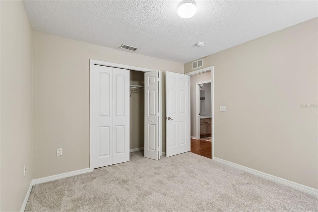 4631 Eagle Ranch Drive Zephyrhills, FL 33542 - Photo 35 of 58 an empty room with closet and entryway