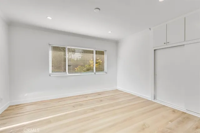 a view of empty room with windows
