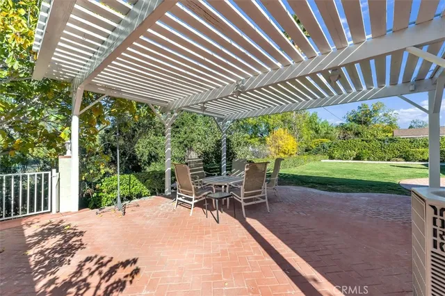 a patio view with a garden