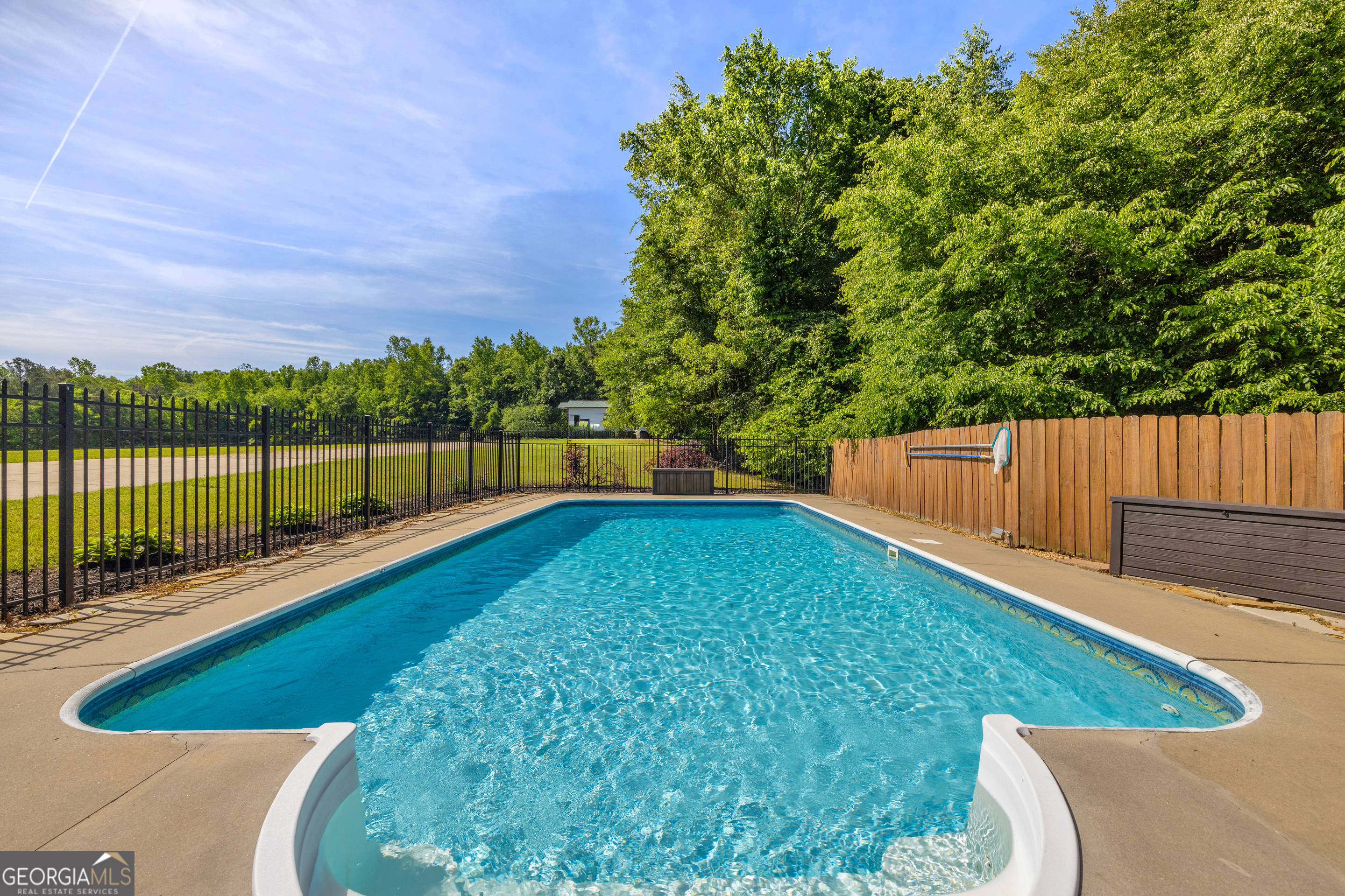 533 Emory Chambers Road Lula, GA 30554 - Photo 15 of 88 a view of a backyard with a lake view