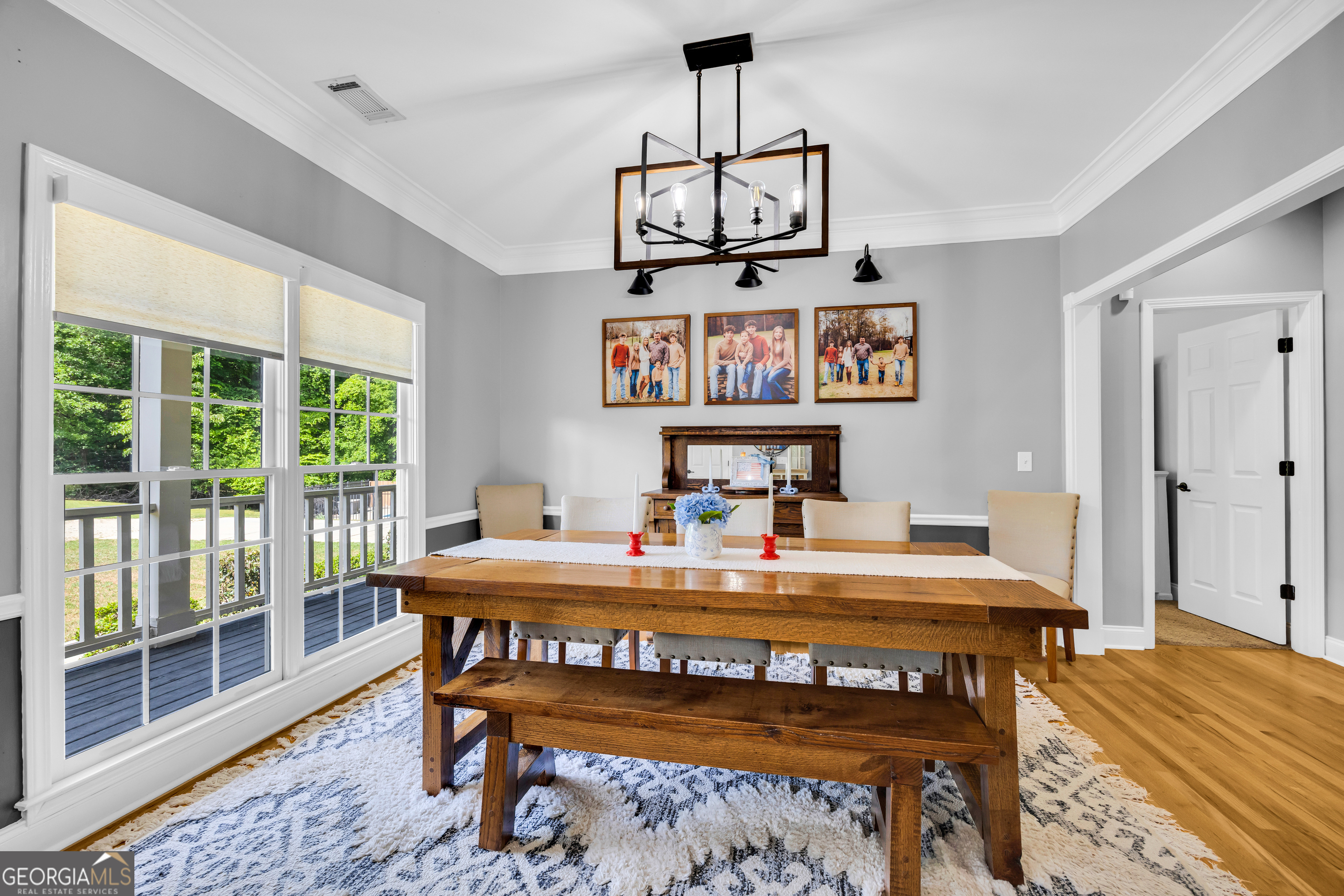 533 Emory Chambers Road Lula, GA 30554 - Photo 20 of 88 a view of a room with furniture wooden floor and windows