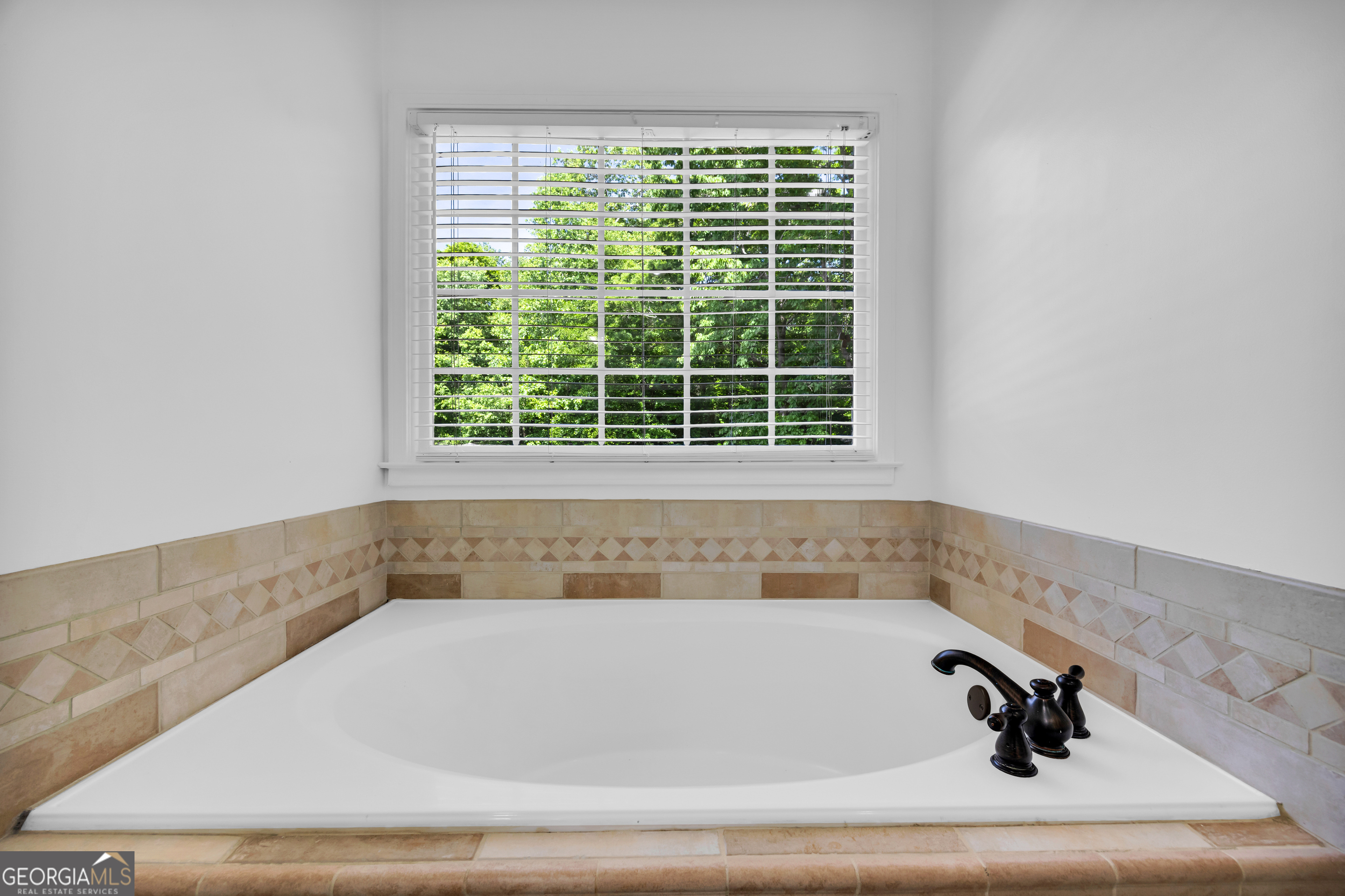 533 Emory Chambers Road Lula, GA 30554 - Photo 43 of 88 a bathroom with a bathtub