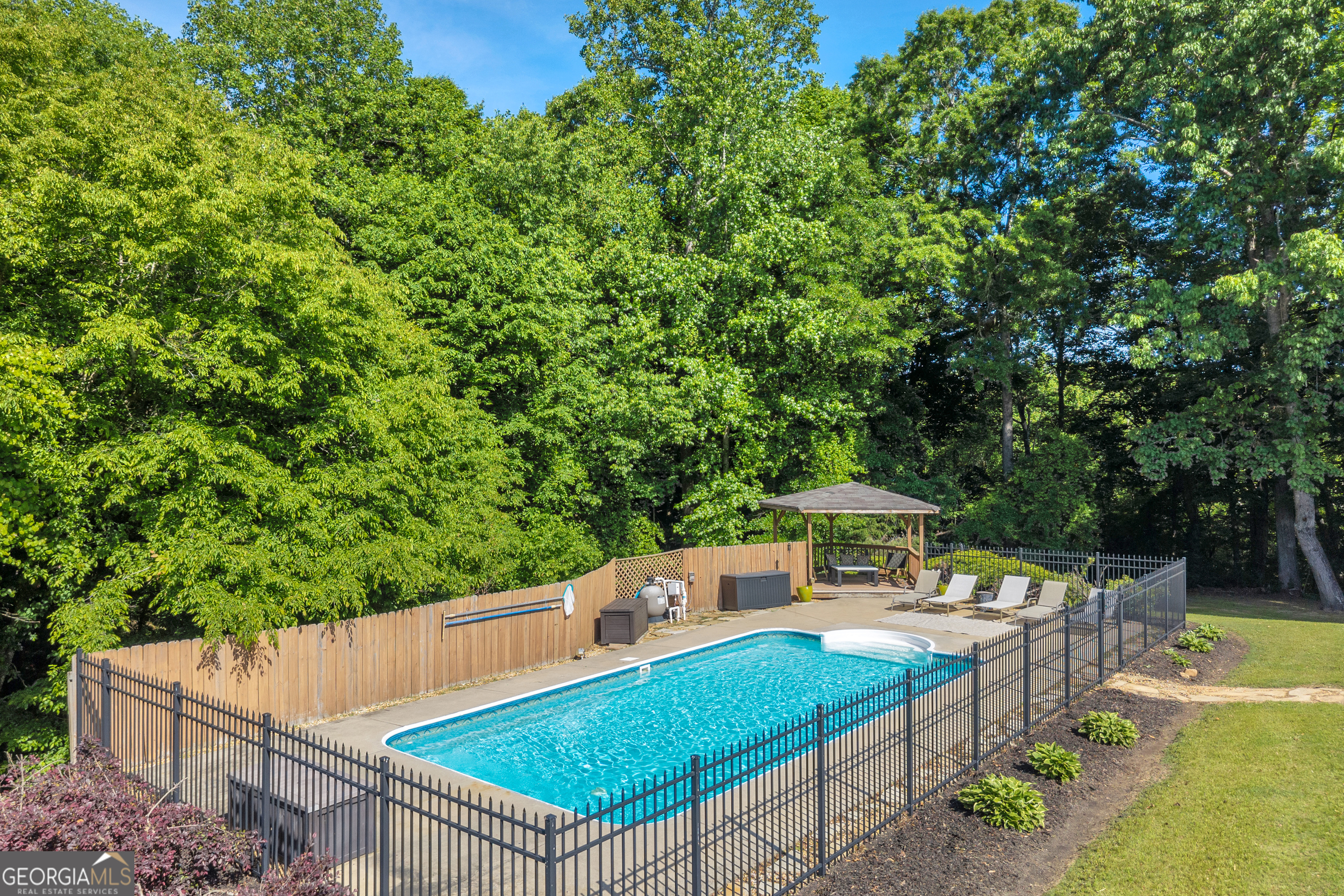 533 Emory Chambers Road Lula, GA 30554 - Photo 5 of 88 swimming pool view with a seating space