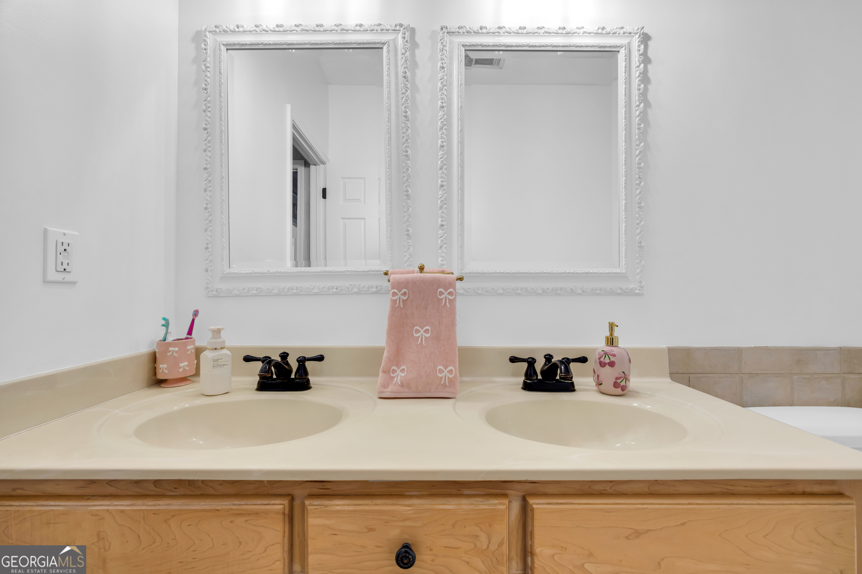 533 Emory Chambers Road Lula, GA 30554 - Photo 54 of 88 a bathroom with a sink and a mirror