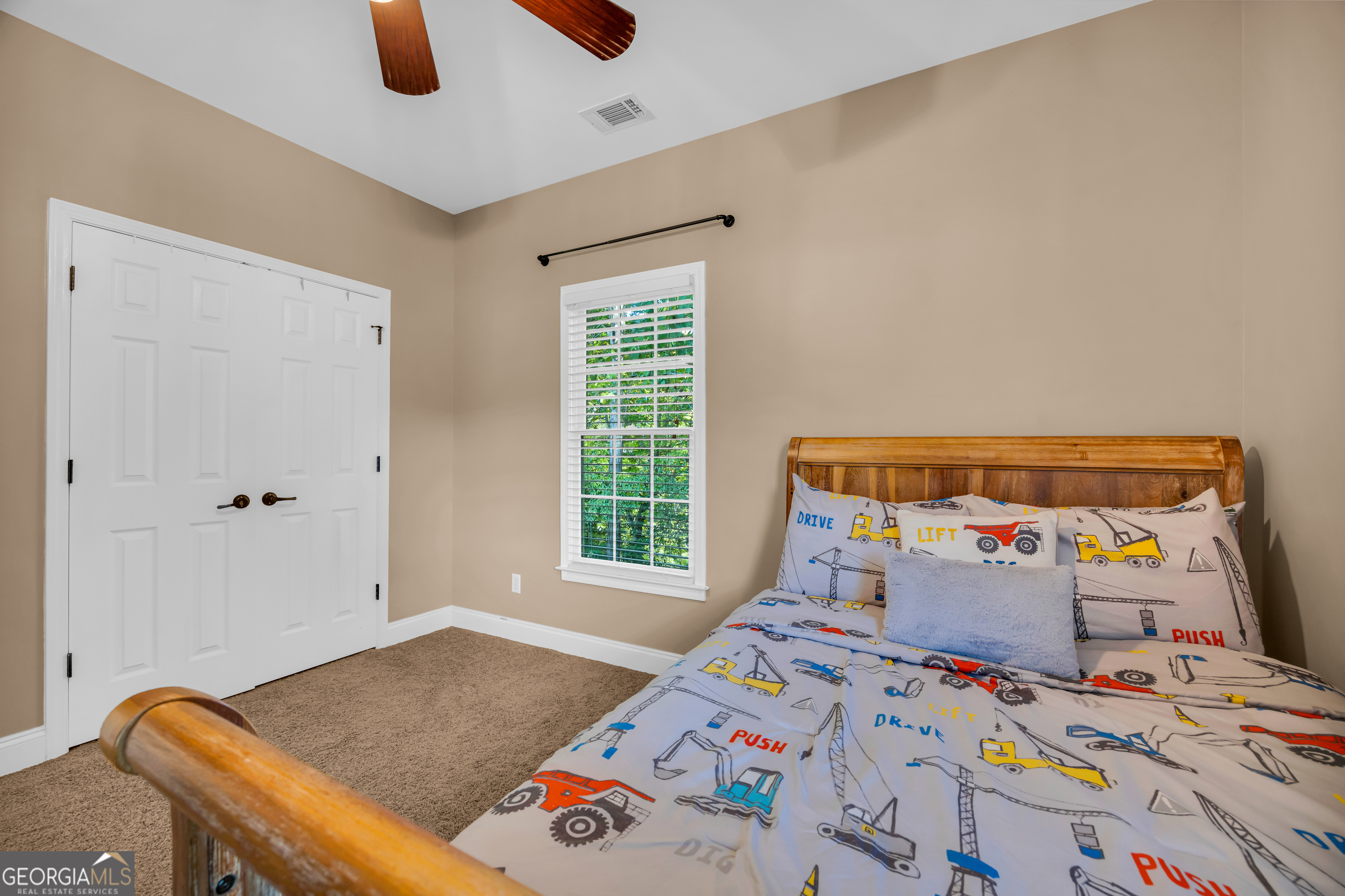 533 Emory Chambers Road Lula, GA 30554 - Photo 56 of 88 a bedroom with a bed and window