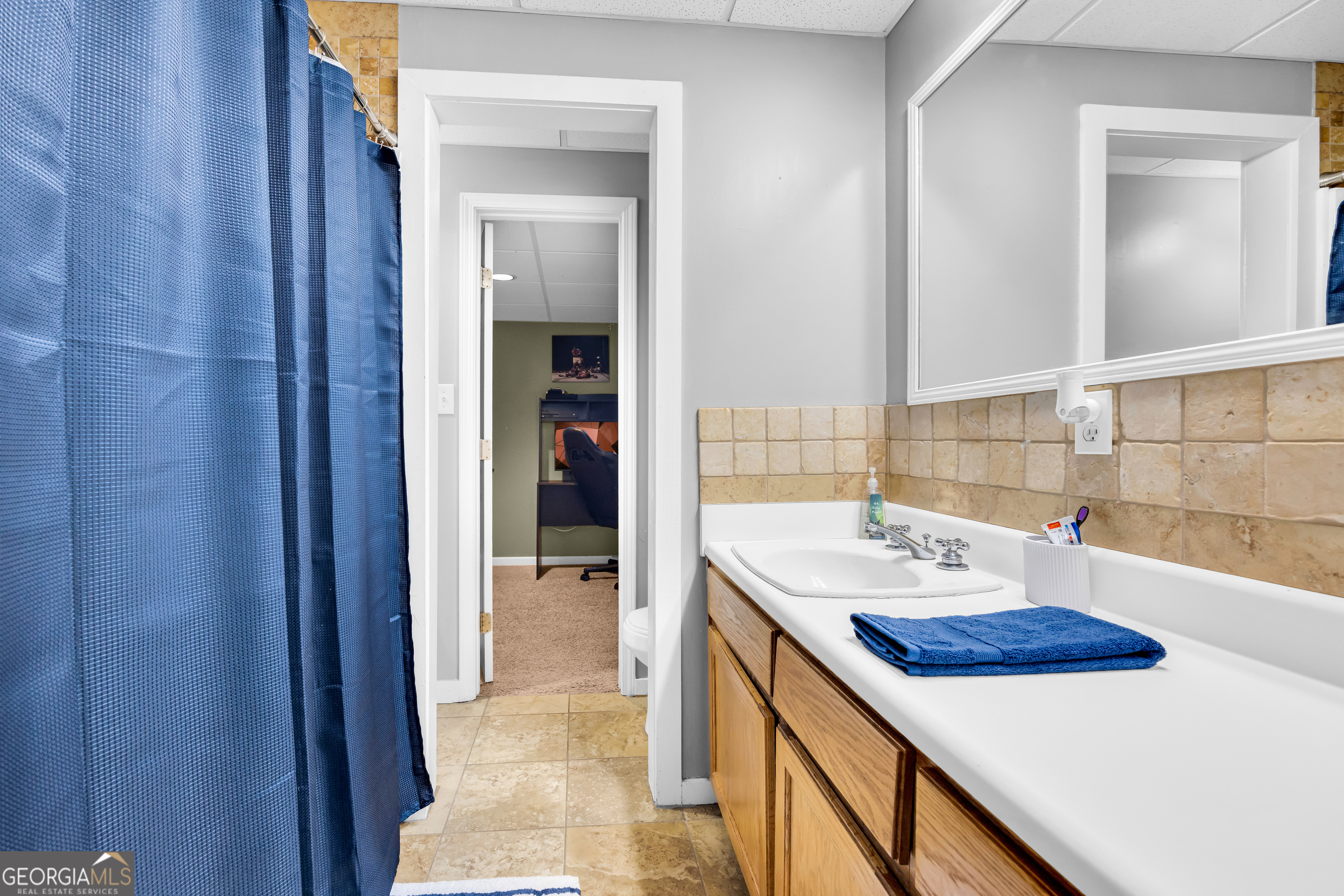 533 Emory Chambers Road Lula, GA 30554 - Photo 76 of 88 a bathroom with a sink and a mirror