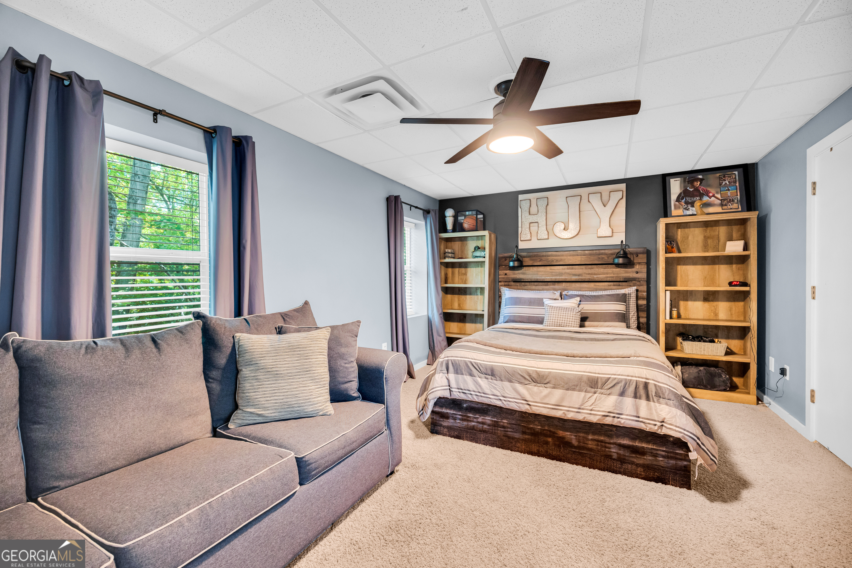533 Emory Chambers Road Lula, GA 30554 - Photo 79 of 88 a spacious bedroom with a bed a window and closet