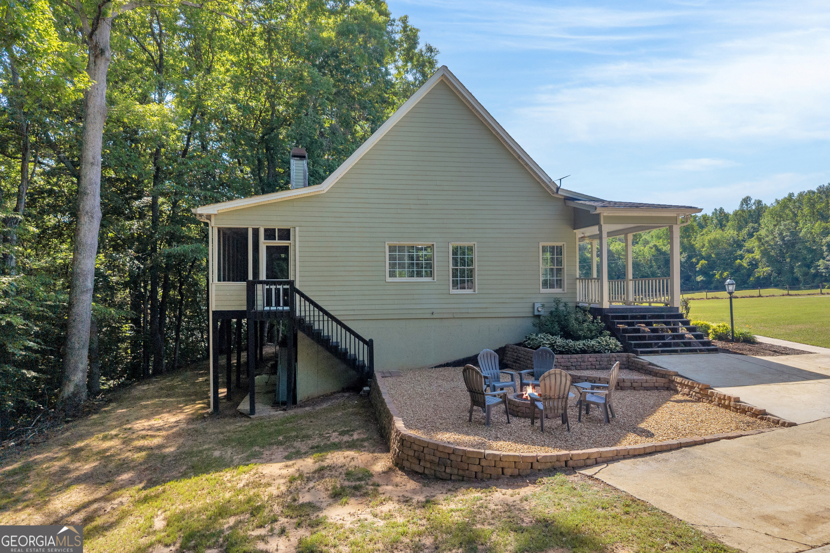 533 Emory Chambers Road Lula, GA 30554 - Photo 9 of 88 a view of a house with backyard and sitting area