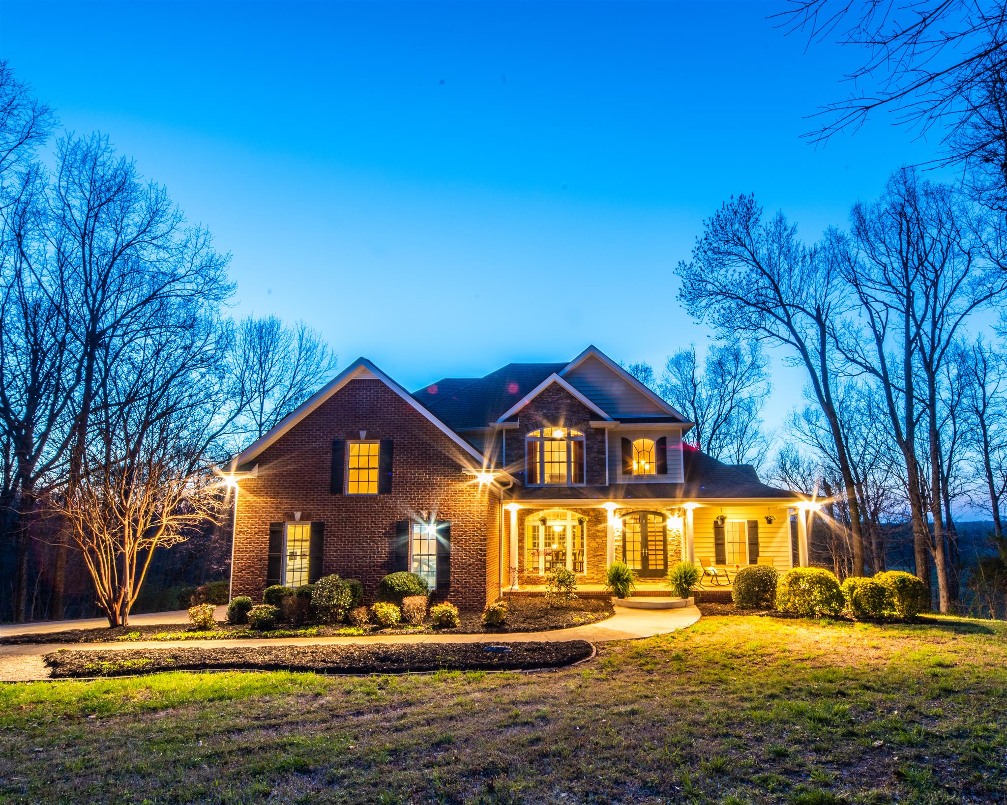 2945 Old Clarksville Springfield Road Adams, TN 37010 - Photo 1 of 30 a front view of a house with a yard
