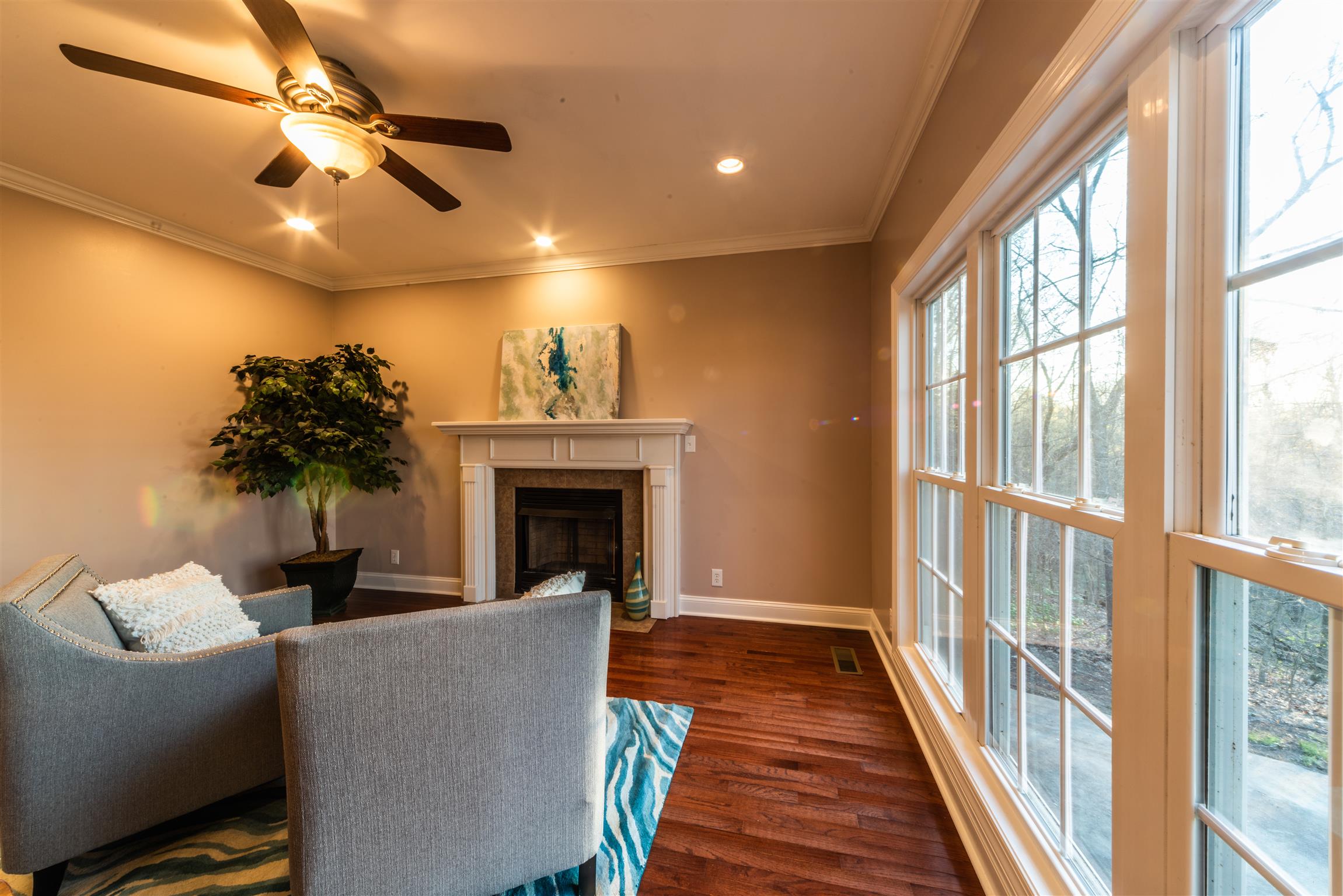 2945 Old Clarksville Springfield Road Adams, TN 37010 - Photo 12 of 30 a living room with furniture a chandelier and a fireplace