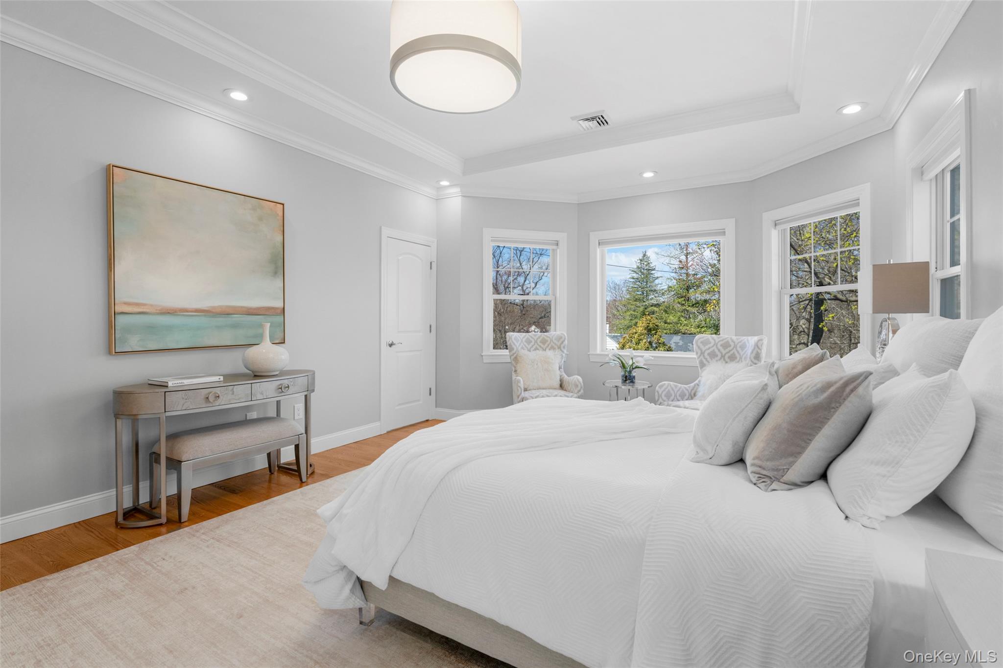 3 Robin Hill Road Scarsdale, NY 10583 - Photo 14 of 32 a bedroom with a bed and a table