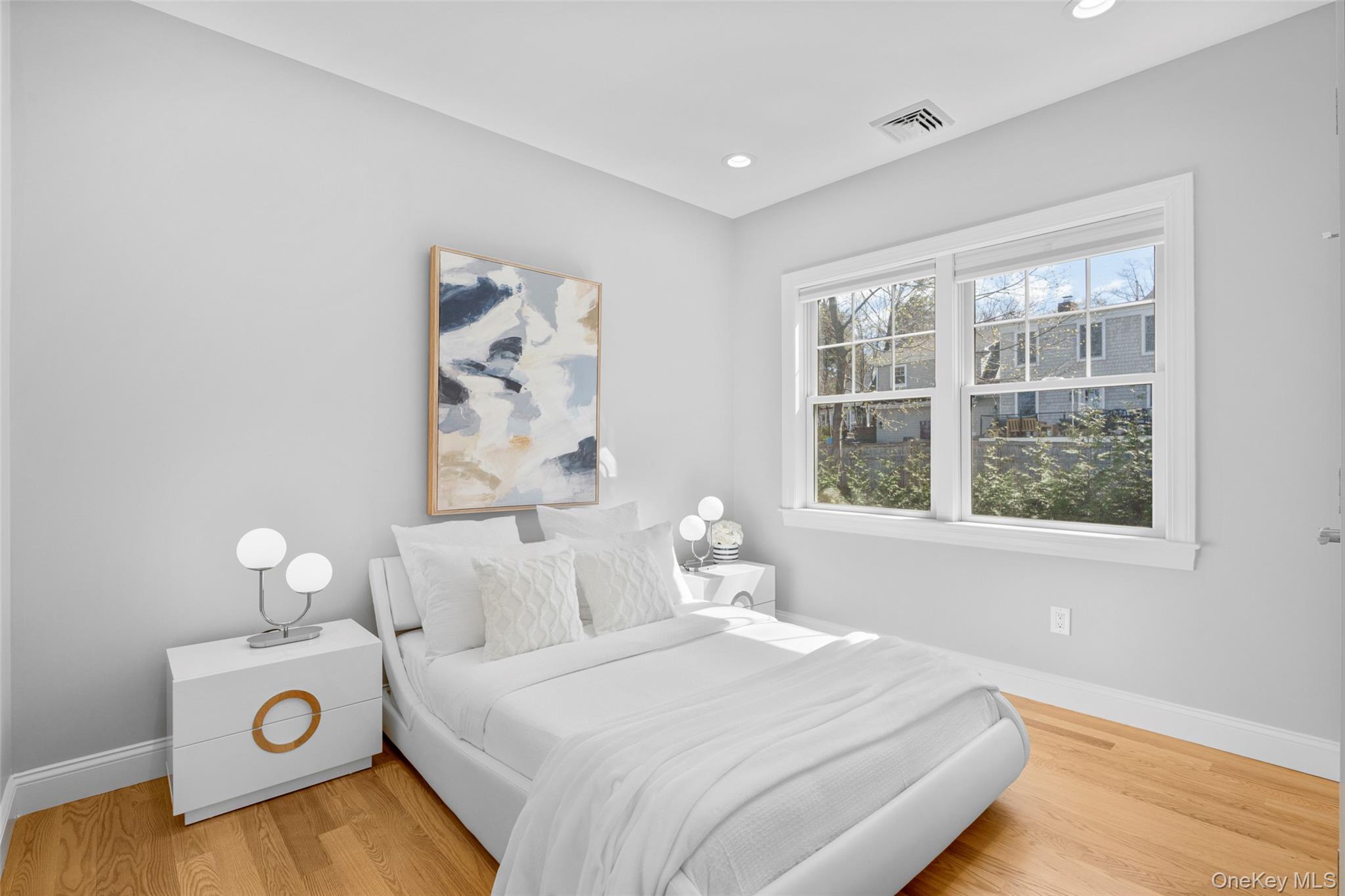 3 Robin Hill Road Scarsdale, NY 10583 - Photo 16 of 32 a bedroom with bed and window