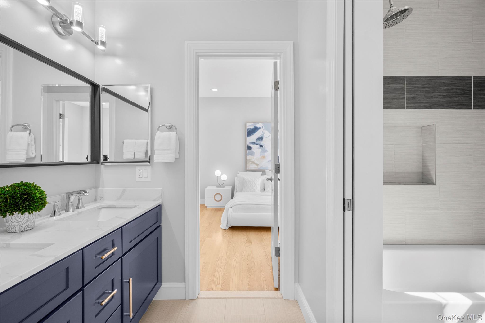 3 Robin Hill Road Scarsdale, NY 10583 - Photo 17 of 32 a en suite bathroom with a granite countertop sink and a mirror