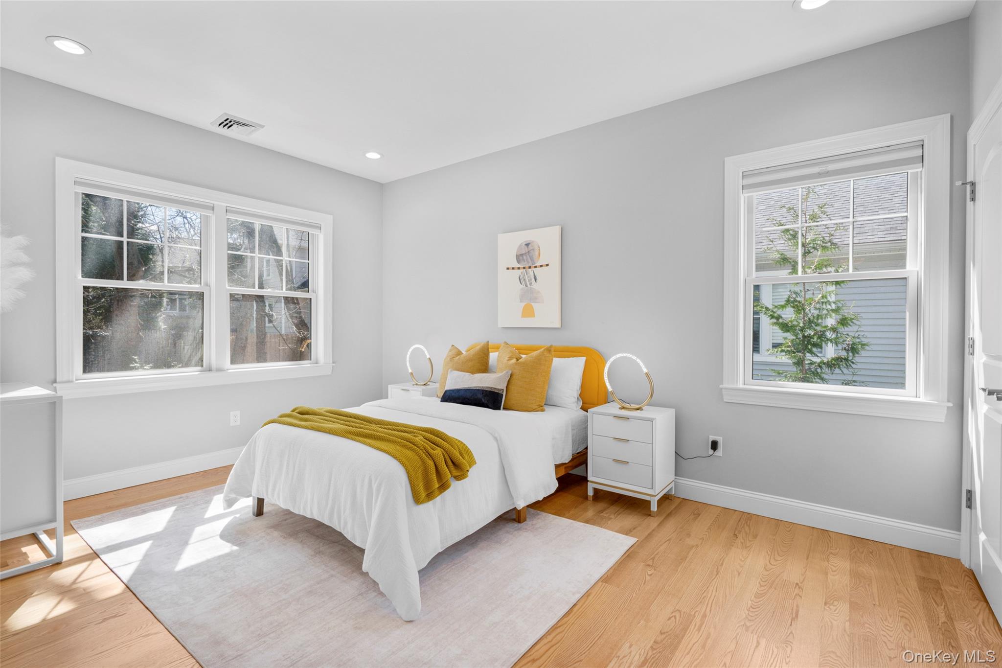 3 Robin Hill Road Scarsdale, NY 10583 - Photo 18 of 32 a bedroom with a bed and a window