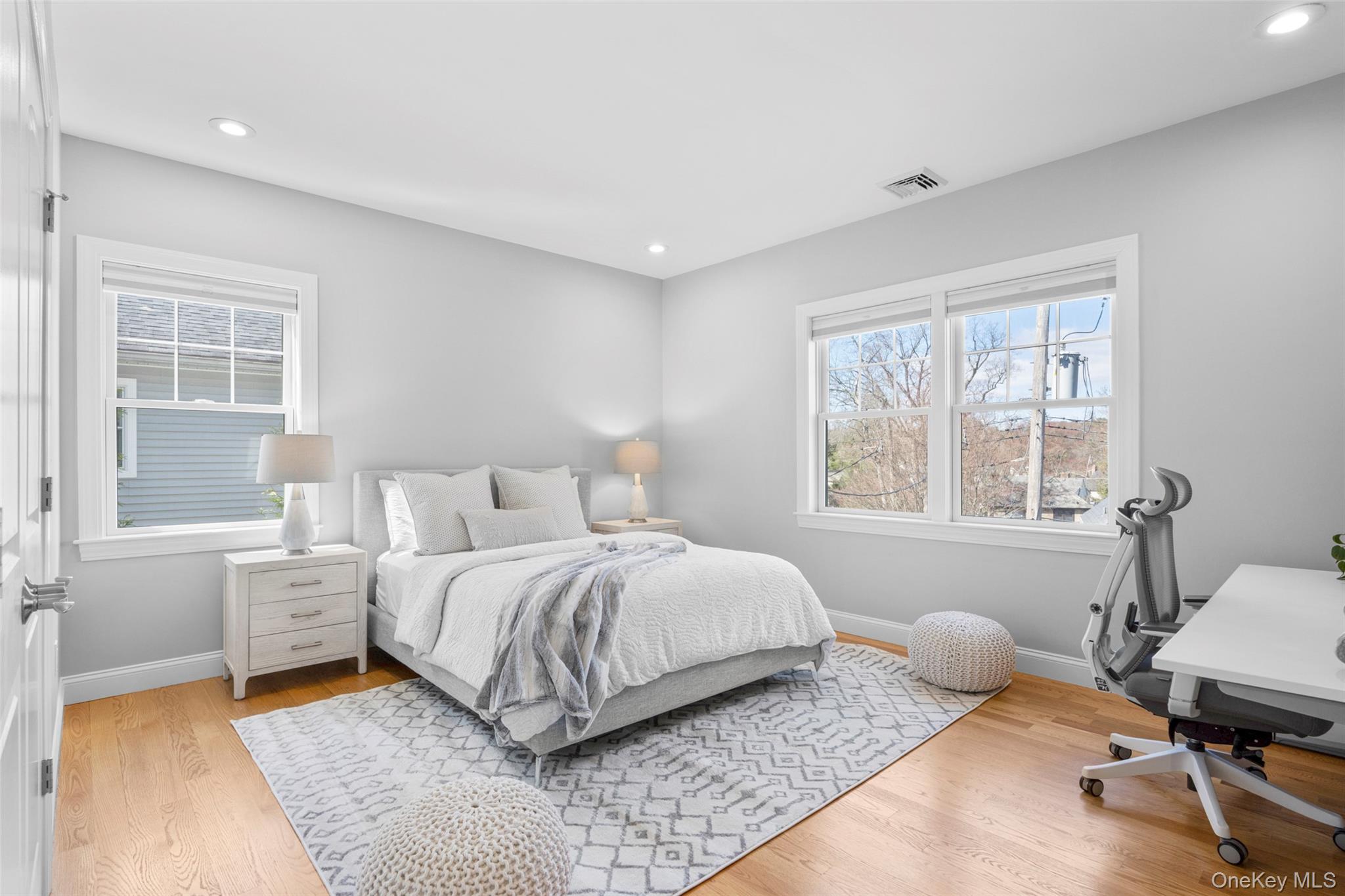 3 Robin Hill Road Scarsdale, NY 10583 - Photo 19 of 32 a bedroom with a bed and a window