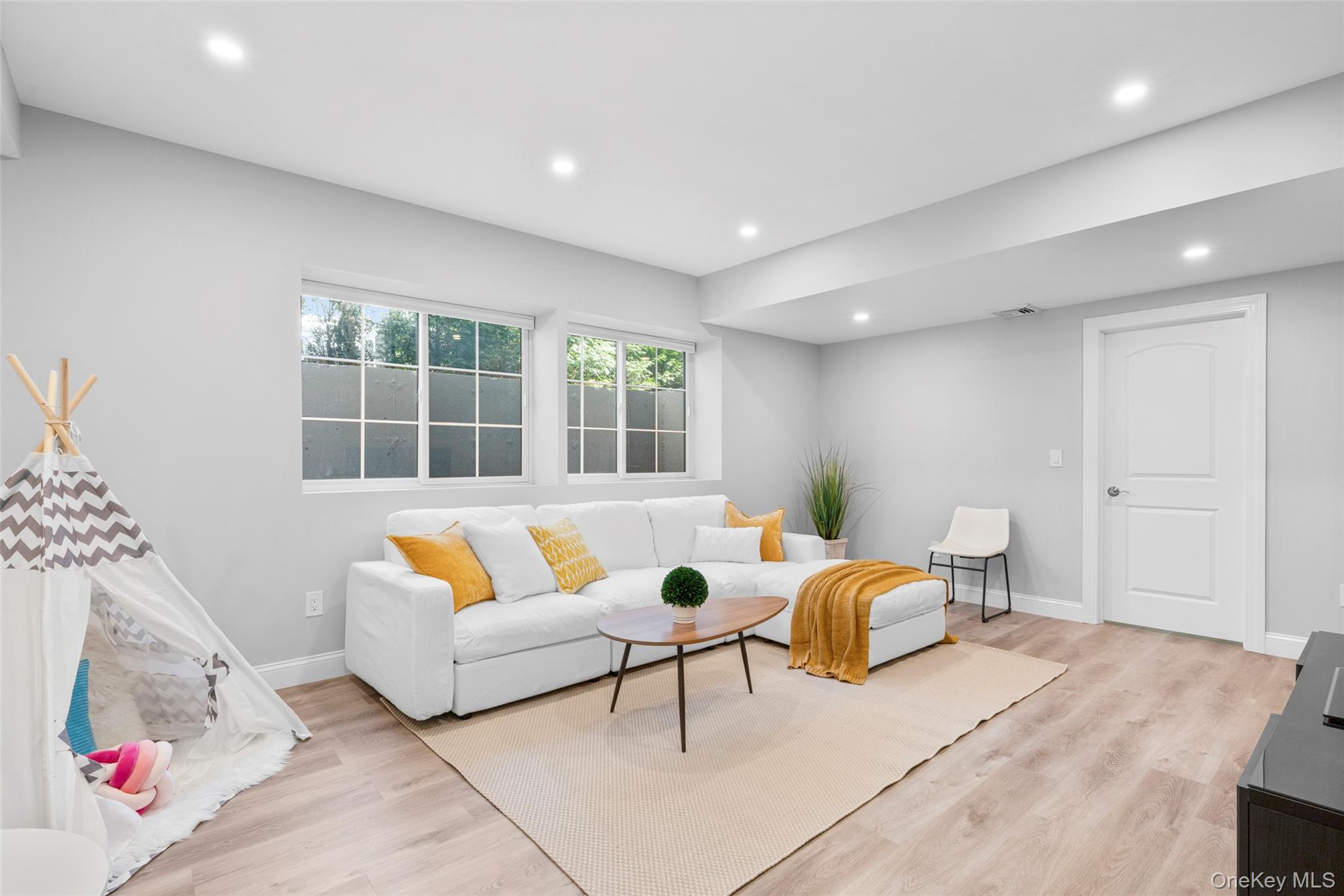3 Robin Hill Road Scarsdale, NY 10583 - Photo 21 of 32 a living room with furniture and window