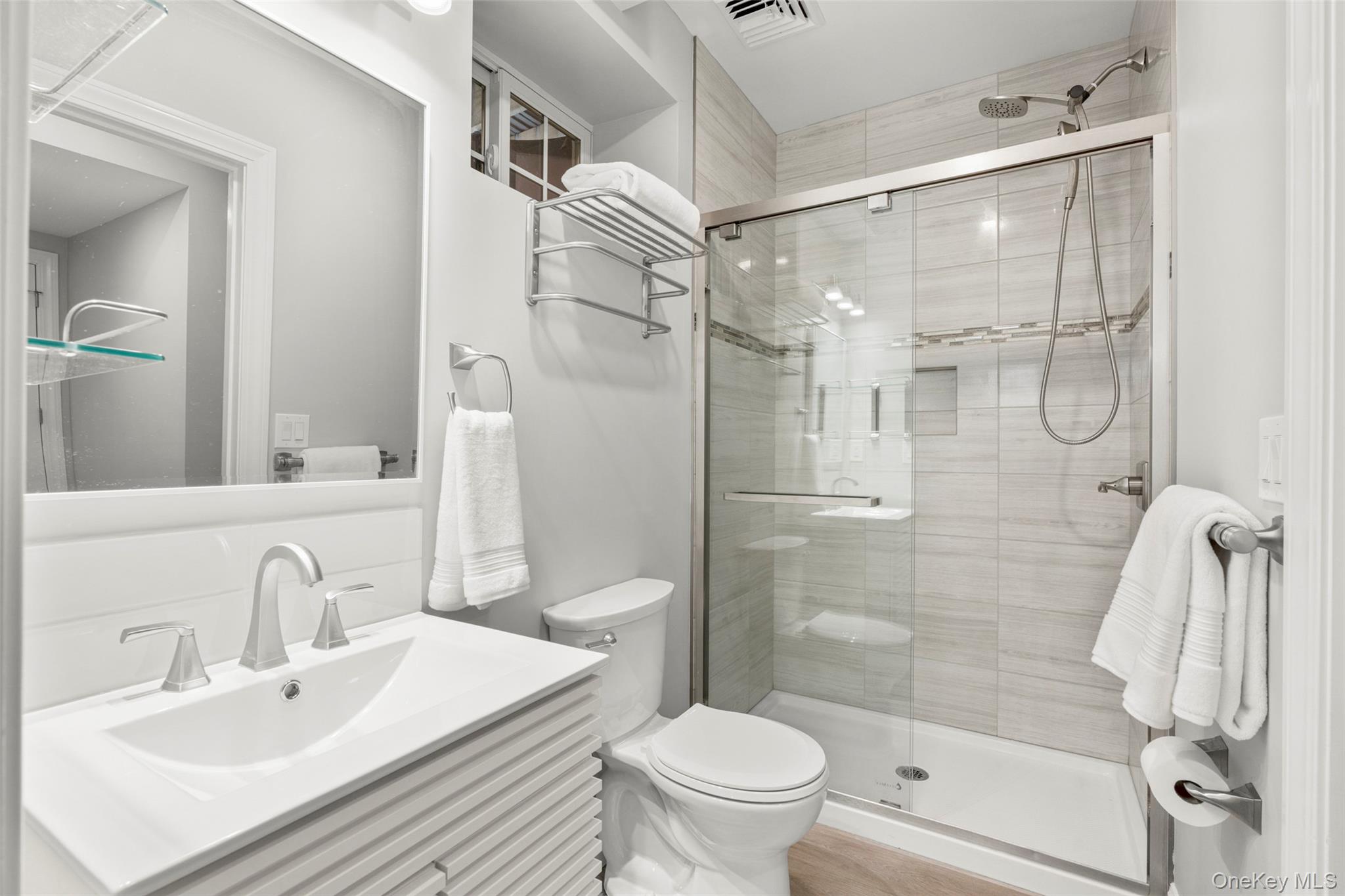 3 Robin Hill Road Scarsdale, NY 10583 - Photo 23 of 32 a bathroom with a sink toilet and shower