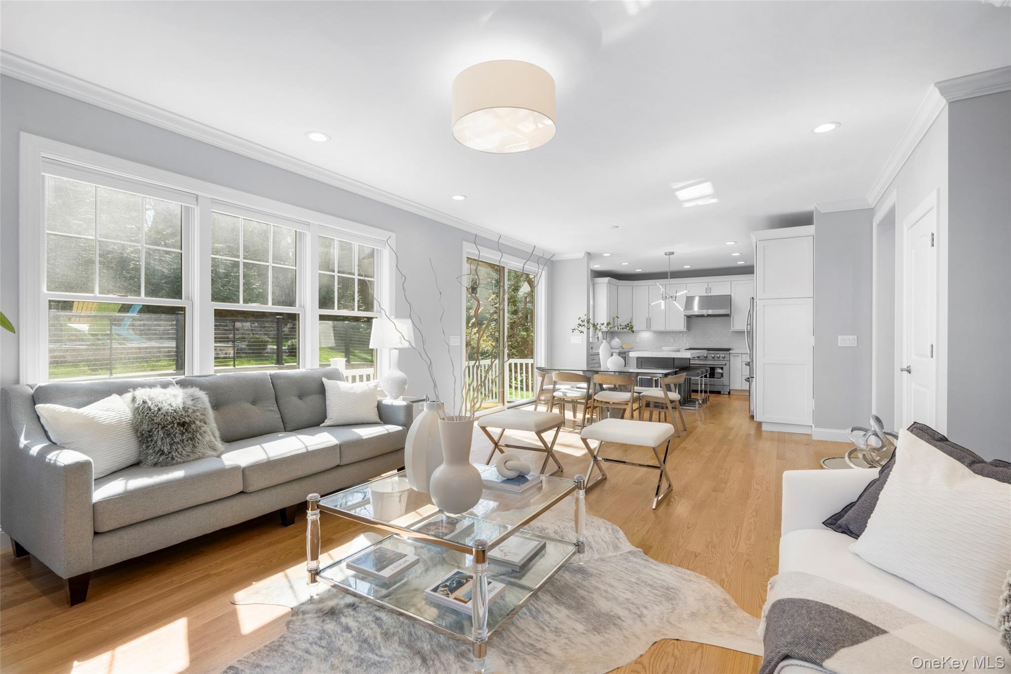 3 Robin Hill Road Scarsdale, NY 10583 - Photo 4 of 32 a living room with furniture and a large window