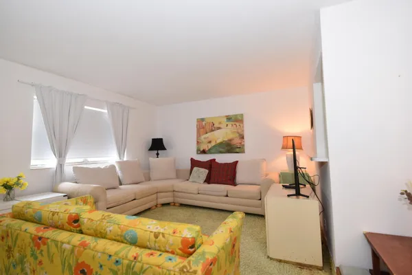 a living room with furniture and a couch